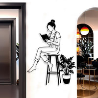 Woman Reading a Book on Chair Metal Wall Decor
