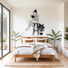 Woman Reading a Book on Chair Metal Wall Decor